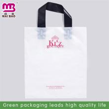 Alibaba certificated manufacturer 100% biodegradable corn starch soft loop handle plastic bag