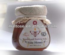 high quality refined bee honey packed in honey bottle