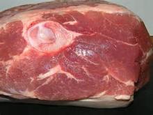 Pork shoulder with bone, rind on, red meat on