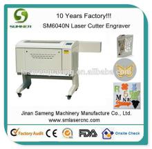 SM6040N 60W 80W with stepper motor honey comb worktable coconut shell laser cutting and engraving ma
