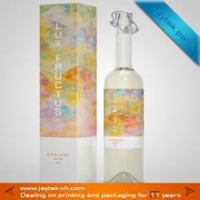 glittering paper champagne bottle carrier