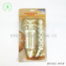 Plastic cake decorator with 8pc moulds