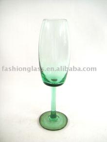 green colored champagne glass