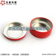 small tin with a window