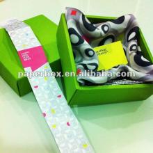 solid green gold foil stamp scarf package gift box with warpped labels and tags