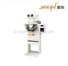 Desiccated coconut weighing & filling machine