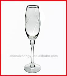 Decorated champagne glass with  cut  flower