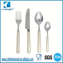 Pretty, white handle corn starch cutlery