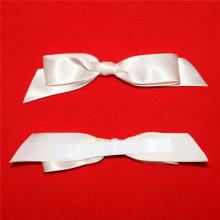craft ribbon bow with adhesive tape
