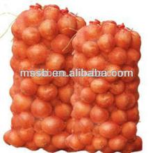 Red and green mesh fruit bags for packing vegetable