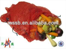 Red and green fruit net bags for packing vegetable