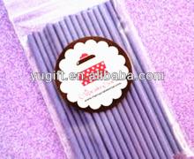 Purple colored paper lollipop sticks