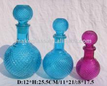 different sizes colored beautiful glass bottle for wine