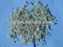 Dried yellow onion flakes