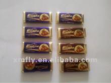 Individual dark biscuit milk compound m&m chocolate snacks packed in pillow bags