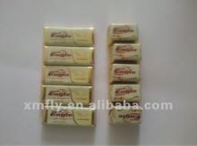 Golden paper wrapped white milk chocolate candy
