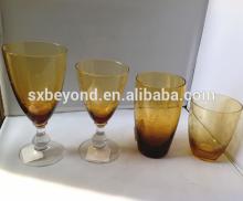 amber stemless champagne glass with wide mouth , mouth blown glass series
