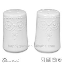  round   white  embossed ceramic salt and pepper jars