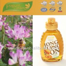 natural bee honey from bee farming in honey bottles