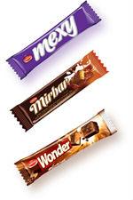 milky compound chocolate coated caramel and nougat bar