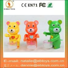 Wind up bear candy toy box play the drum