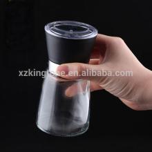 black lid hand-operated  salt  and pepper grinder