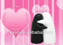 plastic cruet set black and white hugging salt and pepper shaker